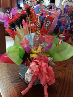 the candy bouquet is sitting on the table