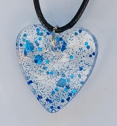 Each of my pieces are totally unique, crafted out of whimsy, for your very own unique expression. Black cord, 18 in, adjustable. Handmade Adjustable Heart Necklace For Valentine's Day, Blue Adjustable Necklace For Friendship, Adjustable Blue Necklace For Friendship, Blue Necklace With Adjustable Cord As Gift, Blue Adjustable Cord Necklace For Gift, Artistic Blue Adjustable Necklace, Blue Jewelry With Adjustable Cord For Gift, Blue Adjustable Cord Jewelry Gift, Blue Jewelry With Adjustable Cord As Gift