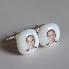 President Obama cufflinks. The picture is printed with a toner enhanced iron oxide, and fired to 1500 F resulting in the image been fused permanently onto the glass. We used white glass as a base and the glass top part of the cufflinks is 5/8" x 5/8" Best quality available metal hardware - Silver plated or sterling silver. picture #1 - set of cufflinks picture #2 - with silver plated hardware picture #3 - with sterling silver hardware. They come in a box. Barack Hussein Obama II (born August 4, 1961) is an American politician and attorney who served as the 44th president of the United States from 2009 to 2017. A member of the Democratic Party, Barack Obama was the first African-American president of the United States. He previously served as a U.S. senator from Illinois from 2005 to 2008 a American Presidents, Democratic Party, Iron Oxide, Tie Accessories, Cuff Links, Suit And Tie, Barack Obama, Metal Hardware, Wedding Shop