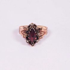 "Brand: Unbranded Ring Size: 4.5 Metal: Yellow Gold Metal Purity: 10k Main Stone Color: Red Sizable: Yes This is a 2.1 Gram 10K Vintage Victorian period rose gold Ring with a Red Center Stone surrounded by Seed Pearls, size 4.5. It is pre owned but shows little if any wear. Stock # R00848Most rings are sizable for a small fee. If the ring you are considering is the incorrect size contact us for a quote.Payment Through Paypal within 3 days of purchase. I ship to U.S addresses only. No internation Victorian Period, Rose Vintage, Vintage Victorian, Seed Pearl, Fine Jewelry Designers, Yellow Gold Earring, Red Stone, Gold Coins, Earring Backs