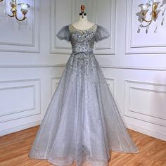 Elegant Silver Gray Evening Dresses: 2024 Luxury Dubai Gowns for Women's Wedding Parties Dubai Gowns, Grey Evening Dresses, Dress Drawing, Dubai Fashion, Wedding Parties, Dresses 2024, Intricate Designs, Formal Event, Timeless Beauty