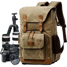 a backpack and camera are sitting next to each other