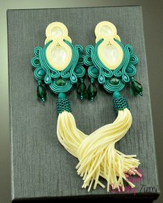 Teal creamy tassel earrings green beige soutache earrings | Etsy Elegant Green Handmade Tassel Earrings, Elegant Handmade Green Tassel Earrings, Elegant Turquoise Earrings With Tassels, Elegant Turquoise Tassel Earrings, Elegant Handmade Turquoise Tassel Earrings, Elegant Turquoise Tassel Earrings For Gifts, Big Statement Earrings, Leather Anniversary Gift, Smart Jewelry