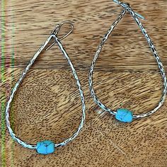 Fun, Boho Style Earrings! Silver Plated, Teardrop Shape Hoop Earrings W/Turquoise Colored Bead Accent Hammered W/ Oxidized Styling Approximately 3” Long Approximately 1-1/4” Diameter Perfect "Go-To" Earrings For Summer New Blue Bohemian Dangle Hoop Earrings, Nickel-free Turquoise Teardrop Hoop Earrings, Nickel-free Turquoise Metal Hoop Earrings, Artisan Nickel-free Turquoise Hoop Earrings, Blue Sapphire Studs, Southwestern Turquoise Nickel-free Hoop Earrings, Boho Style Earrings, Jade Earrings, Statement Drop Earrings