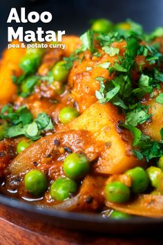 Aloo matar or mutter is an easy-to-make Indian pea and potato curry, it is naturally vegan my version is medium hot & heady with fenugreek. Cooking the potatoes slowly in the gravy over a very low heat allows them to "absorb" the maximum amount of flaovur without them falling apart or turning to mush and creates a wonderful meal! Aloo Mutter Recipe, Aloo Mutter, Aloo Curry, Aloo Recipes, Meat Free Recipes, Fingerling Potatoes, Best Vegetarian Recipes, Potato Curry, Curry Dishes