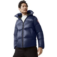 We always bring along the Crofton Puffer Jacket for our winter travels because it pairs classic Canada Goose warmth-retention with travel-ready convenience. This hooded puff packs into the zippered hand pocket and features an easy-access loop for trapping to your pack. Travel Down Puffer Jacket, Travel Puffer Down Outerwear, Travel Down Puffer Outerwear, Winter Travel Nylon Puffer Jacket, Duck Down Puffer Jacket With Double-lined Hood For Outdoor, Outdoor Duck Down Puffer Jacket With Double-lined Hood, Hooded Puffer Jacket For Fall Travel, Functional Hooded Jacket For Winter Travel, Travel Hooded Jacket With Double-lined Hood