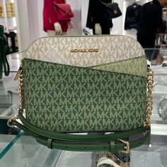 Michael Kors Jet Set Travel Medium Dome Logo Crossbody Bag Fern Green Multi Nwt New With The Tag Authentic This Crossbody Bag Boasts Signature Appeal In Canvas That’s Accented With Top-Stitch Detailing. Rendered In A Structured Dome Shape, It Features An Adjustable Chain-Trimmed Strap And A Convenient Back Slip Pocket. Crossbody Bag Leather/Coated Canvas 100% Leather From Tanneries Meeting The Highest Standards Of Environmental Performance From Tanneries Meeting The Highest Standards Of Environm Michael Kors Handbags Crossbody, Messanger Bag, Brown Crossbody Purse, Brown Crossbody Bag, Michael Kors Crossbody Bag, Brown Leather Handbags, Quilted Crossbody Bag, Black Leather Crossbody Bag, Brown Shoulder Bag