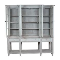 a white bookcase with two drawers on top