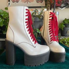 Brand New & Absolutely To Die For. Out Of Box But Only Worn To Try On. These Are Stunning White With Bright Red Laces. Came With Small Scuff By The Zipper, But I Believe It’s A Small Amount Of Glue From Production. Size 10. All Items Come From A Cat Friendly Home. Items Will Ship On Monday And Thursday. Trendy White Closed Toe Platform Boots, White High-top Platform Heels, White High Ankle Heels In Synthetic Material, White Platform Boots With Reinforced High Heel, White High Ankle Synthetic Heels, White Lace-up Heels With Laces, White Platform Lace-up Heels, White High Heel Boots With Laces, White Lace-up Platform Boots