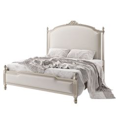 a white bed with an ornate headboard and foot board is shown against a white background