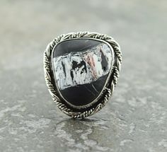 "This is a gorgeous Ribbon Buffalo Turquoise stone that I have set in sterling and fine silver. The top of the ring measures 1 1/4 x 1 inch. This ring is a size 10.75 and can not be re-sized. The band has been stamped \"STERLING\". Metaphysical Properties of Turquoise: Intuitive sources say Turquoise is a stone of wholeness, promoting the sense of unity of the self and oneness with all that surrounds us. It is said to make one feel at home in both the physical and spiritual worlds. Shipping: Shi Southwestern Sterling Silver Ring With Large Stone, Southwestern Sterling Silver Rings With Large Stone, Artisan Sterling Silver Ring With Large Stone, Southwestern Style Rings With Polished Finish, Artisan Turquoise Ring With Large Silver Stone, Artisan Silver Turquoise Ring With Large Stone, Unique Polished Turquoise Ring For Gift, Unique Turquoise Ring With Polished Finish As Gift, Unique Silver Turquoise Ring With Large Stone