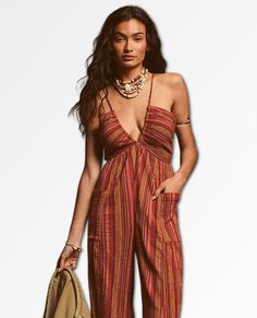 A true FP essential, this wear-everywhere romper is featured in a relaxed, balloon-leg silhouette with plunge neckline, cinch hemlines and woven striped fabrication for added dimension. Dropped side pockets Adjustable tie hemlines Seamed bust detail Care/Import Machine Wash Cold Import Measurements for size small Waist: 29 in Inseam: 29 in 100% Cotton Plunge Neckline, Small Waist, Plunging Neckline, Trendy Fashion, Jumpsuit, Rompers, My Style, Fabric, How To Wear