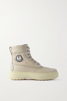 These distinctive textured-leather ankle boots mark a collaboration between Moncler Genius, Palm Angels and Tod’s. Set upon a pebble rubber sole, they have stitch detailing and a unique logo patch. Style yours with cargo pants and a turtleneck. Moncler Palm Angels, Moncler Genius, Logo Shoes, Moncler Women, Shoes Boots Ankle, Brown Ankle Boots, Women Cargos, Unique Logo, Palm Angels