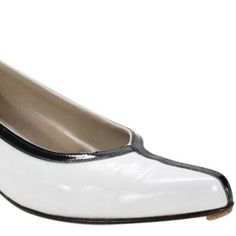 For Sale Is A Pair Of Salvatore Ferragamo, Size 9n, White Leather And Black Patent Leather, 1" Kitten Heels With A Unique, Color Block Design And Almond Shaped Toes! These Are Perfect Shoes For You When You Want A Pair Of White Low Heels With An Edgy Modern Style! The Shoes Are The Perfect Pair Of When You Want A Pair Of White Heels That Are A Little Different! The Low Heels Are Made Of A White Leather And Black Patent Leather In A Size 9n And Have A Great Color Block Look. N10901 Classic Silver Fitted Heels, Classic Fitted Silver Heels, Classic White Patent Leather Heels, Classic Silver Low Heel Shoes, Classic Silver Low Heel Heels, Classic Silver Low Heels, Classic Silver Almond Toe Heels, Silver Patent Leather Heels For Formal Occasions, White Heels With Leather Sole For Galas