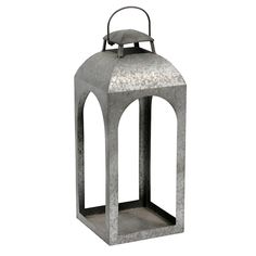 a metal lantern with a white background