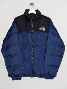 "The North Face 700 puffer jacket in navy blue and black, insulated with goose down. - Size tag: Please always check measurements before buying. Men's L - Measurements (laying flat): Pit to Pit: 25\" Length: 29.5\" Sleeve: 24.5\" Pit to Cuff: 23.5\" Across the shoulders: 22\" -Wear: /Please see images for details/ Overall in good used condition. Stains on the blue part (front, back and sleeves) as visible on the pictures. - Fabric: Nylon Polyester Goose Down *All of our items are preloved pieces so some signs of natural wear and age are to be expected. Please look through the photos carefully to check if the condition is to your satisfaction. *All efforts are made to show any defects however small imperfections may be missed. *We try to describe the sizes as accurately as possible, but ple Navy Puffer Jacket For Winter Outdoor Activities, Navy Puffer Jacket For Winter Outdoors, Navy Winter Puffer Jacket For Outdoor, Blue Insulated Puffer Jacket For Cold Weather, Insulated Blue Puffer Jacket For Cold Weather, The North Face Blue Windbreaker For Fall, Blue Down Puffer Jacket For Streetwear, North Face Puffer Jacket Blue, Dark Blue North Face Puffer