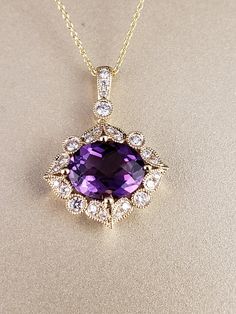 "Amethyst and Diamond Halo Pendant. This vintage look pendant showcases a vivid, deep purple, Oval cut Genuine Amethyst gemstone, suspended in place by (4) substantial gold prongs and surrounded in a halo of genuine bright white Diamonds. All 14k Yellow Gold. **Amethyst is a February Birthstone, and the Pantone color of the year for 2018. **This listing is for the pendant only. Chain not included, for display purposes only. 14kt Yellow Gold chains available for purchase upon request. **Please fe Purple Oval Diamond Cut Jewelry, Oval Purple Diamond Cut Jewelry, Elegant Purple Necklace With Prong Setting, Purple 14k Gold Jewelry With Gemstone Accents, Purple 14k Gold Jewelry With Accent Stones, Purple Necklaces With Accent Stones For Anniversary, Luxury Amethyst Jewelry Stamped 14k, 14k Gold Jewelry With Purple Center Stone, Luxury 14k Stamped Amethyst Jewelry