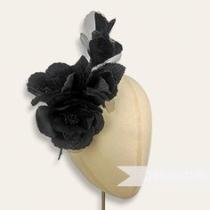 This extra large wired hat mount is EVERYTHING! Made up of two large blooms and four flower buds, this flower mount is entirely made from velvet with a touch of organza! Each petal has been carefully pressed to reveal a beautifully intricate pattern and has two stems of veined and wired leaves backing it.  Total mount length: 20cm (7.9 inches) For our full range of velvet hat flowers visit our Etsy shop here! www.etsy.com/shop/Petershams Orders are posted daily from Canterbury, England with expected delivery times of: Within the UK: 1-5 working days (by 1st Class Post) Outside the UK: 5-15 working days (by Standard Airmail) Upgraded traceable priority services are available for an extra cost at checkout. Kentucky Derby Handmade Flower Hair Accessories, Flower Headpieces For Kentucky Derby, Kentucky Derby Flower Hair Accessories, Kentucky Derby Handmade Flower Headband, Kentucky Derby Flower Headband With Handmade Flowers, Flower Shaped Fascinator For Kentucky Derby, Kentucky Derby Flower Headpieces With Handmade Flowers, Floral Headpieces For Races With Handmade Flowers, Adjustable Flower-shaped Fascinator For Races