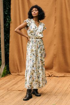 Between the pretty floral print and all those ruffles, this tiered maxi dress exudes romance. It's tied at the neckline, layered beautifully at the sleeves, and comfortably cinches in at the waist. •Split neckline with self-tie •Ruffle trim •Layered short sleeves •Elasticized waist •Tiered Item Number: 96222 100% POLYESTER Dress Length: 54 1/2" Tiered Floral Dress With Ruffles For Daywear, Feminine Tiered Skirt Maxi Dress For Daywear, Feminine Tiered Maxi Dress For Daywear, Tiered Floral Dress For Garden Party, Floral Print Maxi Length Tiered Dress For Brunch, Daywear Floral Print Tiered Maxi Dress, Floral Print Tiered Maxi Dress For Daywear, Tiered Floral Print Maxi Dress For Daywear, Tiered Maxi Dress With Floral Print For Daywear