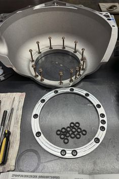 an image of a metal object being worked on