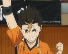 an anime character raising his arm in the air