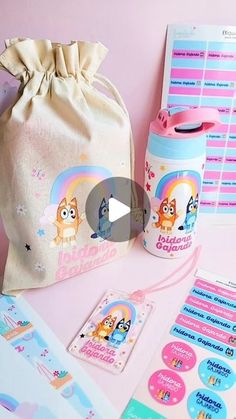 an image of a bag with stickers on it and other items in front of it