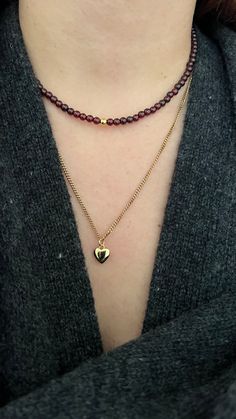 Classy chain choker necklace for everyday wear with heart pendant. LENGTH: +5 cm extension chain. CLOSURE: lobster claw. MATERIALS: stainless steel 18k gold plated chain, brass 18 k gold plated heart and furniture. You might also like garnet beaded necklace: https://www.etsy.com/listing/1675993263/beaded-garnet-choker-necklace-red?click_key=4dde73a1c8c53f8e2f00ce840abc00e31fc65c75%3A1675993263&click_sum=ca191d7f&ref=shop_home_active_1&pro=1 PLEASE NOTE, COLORS might be different because of your monitor! Pleace, note that sometimes DELIVERY CAN TAKE MORE TIME, than usually due to customs controls or festivities. You can see more beaded accessories and reviews about my work in my second Etsy shop: https://www.etsy.com/shop/MuzaJewellery Heart Charm Choker For Valentine's Day, Valentine's Day Heart Choker Necklace With Adjustable Chain, Valentine's Day Metal Choker With Heart Charm, Heart Charm Metal Choker, Garnet Choker, Vintage Heart Charm Choker, Necklace For Everyday, Necklace Y2k, Pendant Choker Necklace