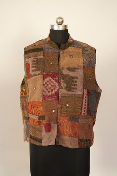 Welcome To Our Shop Product: One-Of-A-kind Handmade 100% Cotton Vintage Kantha Jacket. Color: Multi-color as Shown in Image. Fabric: 100% cotton ( Handmade In India ) The design of the jacket is very unique and very rare. Indian culture and associated with grace and beauty. Old hand made raali more then 1970s old pieces collected From villages Of Thar Desert converted into the vintage jacket and backside beautiful embroidery elephant work, This Raali belongs to higher caste people they give this raali carpet to her daughter in marriage DOWRY, due to very old I collected From the desert village of Rajasthan. There are many Makers known as Meghwals in the Indian caste system (untouchable people), who have been making clothes by hand for society since ancient times. Raali was used to be a gre Traditional Multicolor Outerwear With Pockets, Multicolor Cotton Winter Vest, Casual Cotton Nehru Jacket For Winter, Multicolor Festival Outerwear With Pockets, Bohemian Multicolor Outerwear With Pockets, Multicolor Cotton Festival Outerwear, Bohemian Cotton Nehru Jacket For Fall, Multicolor Cotton Hippie Outerwear, Multicolor Cotton Nehru Jacket For Winter