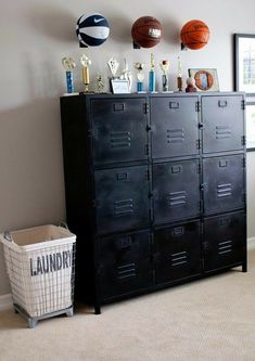 a black locker with basketballs on the top