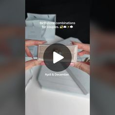 a woman is opening a box with the words birthday congratulationss for couples on it