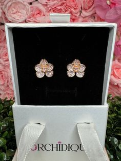 Orchidique Thai Vanda Zircon Earring Studs in Sterling Silver- 14k Rose Gold Plated 🌸 Size: 15mm – The perfect size for everyday elegance. 🌸 Material: 💐 Base: Luxurious S925 Sterling Silver – Durable and hypoallergenic. 💐 Plating: Radiant rose gold – Adds warmth and a touch of romance. 💐 Accents: Genuine Lavender zircons – Shimmering petals, dazzling center, and a delicate zircon on the labellum. 🌸 Design: Unique, one-of-a-kind Thai Vanda orchid pattern – Inspired by our very own orchids and meticulously crafted. 🌸 Perfect For: Adding a touch of luxury to any outfit, special occasions, or gifting to someone who appreciates fine jewelry. 🌸 Description: Crafted from high-quality S925 sterling silver and finished with a luxurious 14K rose gold plating, these earrings are both hypoalle Orchid Pattern, Vanda Orchids, Everyday Elegance, Zircon Jewelry, Earring Studs, Floral Jewellery, Orchid Flower, Gold Plated Necklace, Flower Earrings