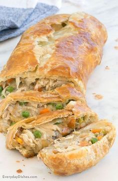 a chicken pot pie is cut in half