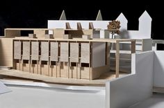 a model of a building made out of wood