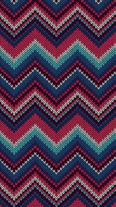 a knitted chevron pattern in blue, pink and green