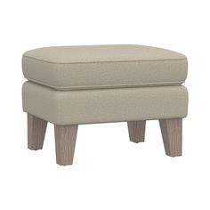 the foot stool is made from wood and has a beige upholstered fabric cover