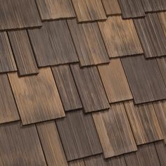 a brown roof with wooden shingles on it