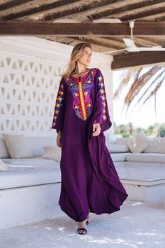 *Note : The kaftan in the video is a different color and is only displayed to show the fit, flow, and cut of the Kaftan. You will receive the one in the pictures.* A bohemian flash caftan made of light mesh of linen and poly, the fabric is unique in that it's very flowy and not the usual feel and touch of linen. This Kaftan is ideal to wear for any casual occasion. Whether taking a trip down the shopping lane, or home-based kitty parties, or about anything else, wearing this dress will make you Long Purple Bohemian Kaftan, Purple V-neck Kaftan For Festival, Purple Kaftan For Summer Beach Cover-up, Purple V-neck Kaftan For Beach Cover-up, Floor-length Purple Bohemian Kaftan, Kitty Party, Cat Party, Free Size, Style Expert