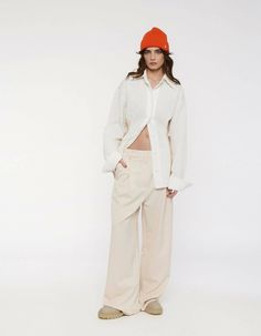 At the intersection of everyday and occasionwear, the RYE trousers find a smart-casual balance that makes this transseasonal piece the champion of versatility. The fluid drape emphasizes the long, wide-leg silhouette while the lowrise fit adds a cool, laidback vibe. Detailed with pleats, the RYE trousers offer a classic sleek look. The model is 178 cm and wears a size S.Composition: 15% RAY, 80% PES, 5% SP Machine wash at 40°. Iron on medium. Do not bleach. Do not tumble dry. Please be aware tha Spring Oversized Wide Leg Work Pants, Spring Wide Leg Relaxed Parachute Pants, Relaxed Wide Leg Parachute Pants For Spring, Spring Wide Leg Parachute Pants, Oversized Wide Leg Pants For Fall Workwear, Effortless Wide Leg Workwear Pants, Modern Relaxed Fit Wide Leg Pants With Elastic Waistband, Effortless Wide Leg Straight Pants For Work, Modern Relaxed Fit Wide-leg Pants