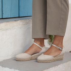 100% Vegan, Organic and Sustainable. Authentic Espadrilles, Handcrafted by Artisans. Designed in Barcelona, Made in Spain These organic cotton canvas espadrilles with a 2" inch low wedge heel are inspired by the Mediterranean and designed for breathability, comfort, and style. Made in Spain, these are an authentic pair of exquisite, espadrilles - made by artisans who preserve centuries-old traditions of shoemaking. * Lightweight Summer Espadrilles * Authentic. Made by artisans in Spain * Designed for breathability, comfort, and versatility * 100% Organic Cotton upper * 2" Low wedge heel * Adjustable ankle strap * Comfy cushioned insole * Natural jute midsole with a vulcanized rubber sole * Wear with just about anything - summery dress, cute shorts, fave jeans & more! Timeless in BEIGE TAN, Summer Espadrilles, Spanish Espadrilles, Womens Espadrilles Wedges, Vegan Sandals, Low Heel Wedges, Tan Wedges, Women's Espadrilles, Low Wedges, Vegan Shoes