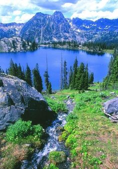 a mountain lake surrounded by trees and rocks