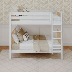 a white bunk bed sitting on top of a hard wood floor next to a wall