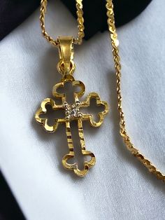 Dainty Vintage 14k Yellow Gold DIAMOND Cross 15" Serpentine Chain Necklace It is in nice pre-owned condition! Perfect for a gift! * The pretty diamond cross pendant measures approximately 6/8" high with bale x 3/8" wide. * Natural small diamond accent in center of cross! * Comes included with a solid 14k yellow gold 15" Serpentine chain necklace! * Weighs 1.6 Grams total * Please message me with any questions. Shipped FAST and FREE, fully insured and in a gift box. I guarantee item to be exactly Diamond Cross Pendants, Diamond Cross, Dream Jewelry, Cross Pendant, Gold Diamond, Necklace Etsy, Jewelry Necklace Pendant, Chain Necklace, Gift Box