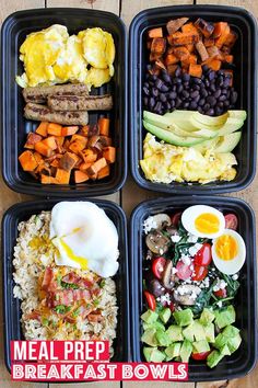 four black trays filled with different types of food on top of a wooden table