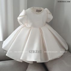 10% off now|Free shipping world-wide. Couture Ivory Satin Ruffled Jeweled Neckline Flower Girl Dress with Short Sleeves at GemGrace. Click to learn our pro custom-made service for wedding dress, formal dress. View #FlowerGirlDresses for more ideas. Princess Style Short Sleeve Baptism Dress, White Short Sleeve Princess Dress For Dress-up, Elegant First Communion Dress With Short Sleeves For Pageants, Elegant Princess Dress With Ruffles For First Communion, Fitted Princess Style First Communion Dress With Short Sleeves, Fitted Short Sleeve Princess Dress For Wedding, Fitted Short Sleeve Princess Wedding Dress, Satin Short Sleeve Dress With Ruffles, Short Sleeve Satin Dress With Ruffles