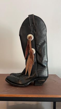 Vintage Harley Davidson Cowgirl Boots with Tassels in size Women's 5 Sold as is, Some scuffs on the toes and one of the Fringe sizes is cut with some stains. This item is vintage/used. Please view pictures as part of the description, all vintage items are final sale. Check out my other cool vintage finds at : https://www.etsy.com/ca/shop/thatssothrifted Boots With Tassels, Vintage Cowgirl Boots, Harley Davidson Vintage, Vintage Cowboy Boots, Vintage Cowgirl, Cow Girl, View Pictures, Cowboy Western, Vintage Harley Davidson