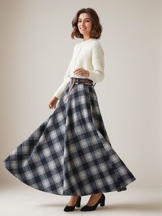 This winter wool skirt is a classic piece of tailoring that will see you through rain or shine. It is cut with a flattering flared skirt to give you a wonderful shape. The winter skirt is perfect classic styling and ends at the ankle. This is a versatile skirt that you'll wear again and again. DETAILS: * 30% wool, 30% fiber, 40% polyester * fully satiny liner * Two side pockets * Right zip closure * has belt loops to keep everything in place * back elastic band to provide some stretch * Plus size full skirt, warm thick winter skirt * Ankle length skirt * Perfect for Winter, autumn * Lean More about the items From the FAQs on the page bottom * The model is 170 cm (5′ 7″) tall with a 80 cm (31.5") bust, 66 cm (26") waist. She is wearing the wool plaid skirt in size XS. CUSTOM MADE SERVICE If Elegant Plaid Skirt For Work, Plaid A-line Skirt With Lining, Classic Plaid Skirt For Fall, Wool Long Skirt For Fall, Wool Lined Maxi Skirt For Winter, Wool Maxi Skirt For Workwear In Winter, Winter Wool Lined Maxi Skirt, Fall Wool Lined Maxi Skirt, Fall Wool Long Skirt