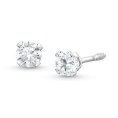 Sweet and simple, these stud earrings each showcase a 3.0mm round cubic zirconia in a traditional four-prong setting. Perfectly sized for her little ears, these post earrings secure comfortably with screwbacks. Classic Round Cut Diamond Piercings, Classic Diamond Piercing With Brilliant Cut, Classic Round Cut Cubic Zirconia Piercings, Classic Diamond White Gold Piercings, Classic Round Piercings With Prong Setting, Classic White Gold Diamond Piercings, Classic Diamond White Cubic Zirconia Piercings, White Gold Round Brilliant Cut Piercings, White Gold Brilliant Cut Piercings