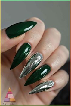 Green acrylic nails have taken the beauty world by storm, and it's easy to see why. This vibrant, versatile color can range from the softest mint to the deepest forest, making it a perfect choice for anyone looking to add a pop of color to their look. Green nails evoke freshness, growth, and a connection to nature, giving you a refreshing and unique aesthetic that stands out in any crowd. Nails Green And Silver, Forest Green Nails Acrylic, Silver And Green Nails, Ice Blue Nails, Forest Green Nails, Green Manicure, Plaid Nail Designs, Silver Nail Designs, Neon Green Nails