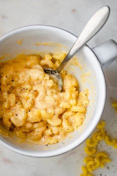 a white bowl filled with macaroni and cheese