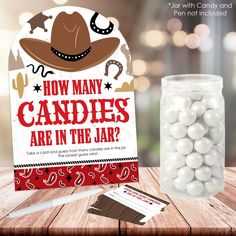 there is a jar with candy in it next to a card that says how many candies are in the jar?